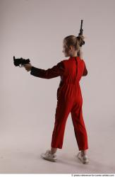 DENISA WITH TWO GUNS